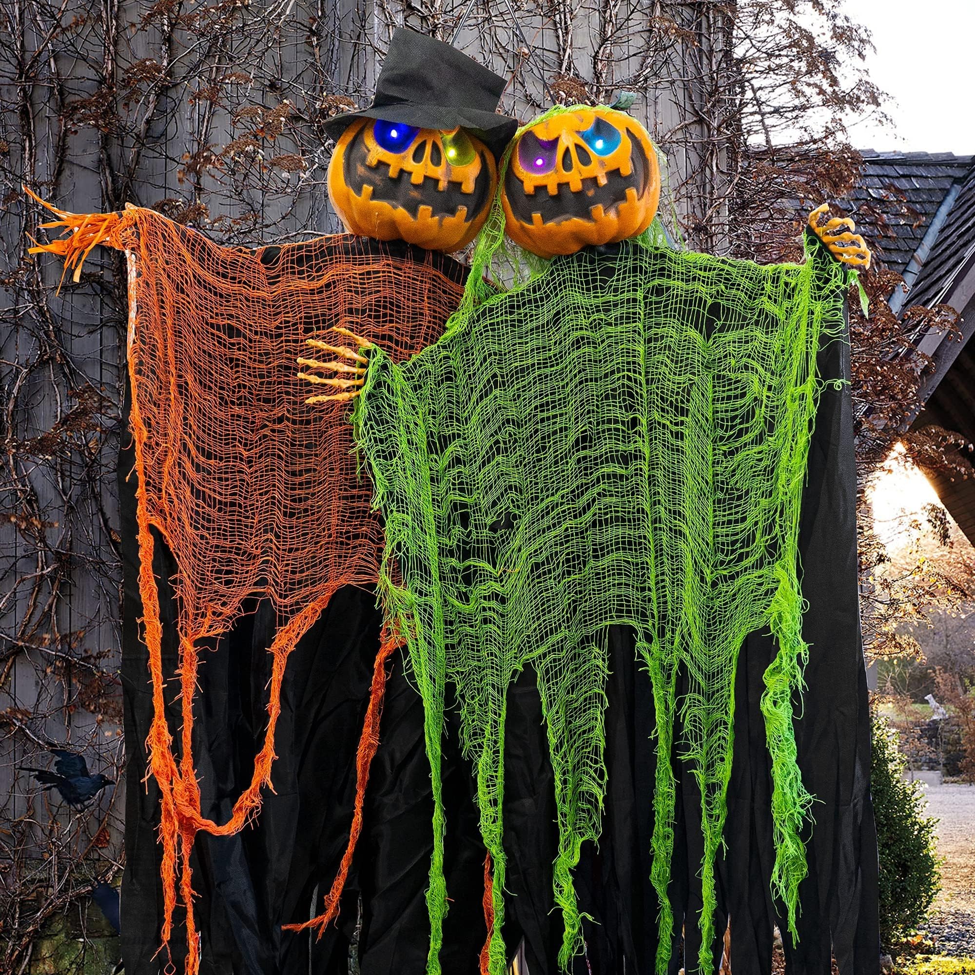 Photo 1 of FUNPENY 2 Pack 5.2' Hanging Ghost Pumpkin with Bendable Arms, Halloween Skeleton Pumpkin Decorations with Color Changing Lighted Eyes for Halloween Party Lawn Outdoor Indoor Decor