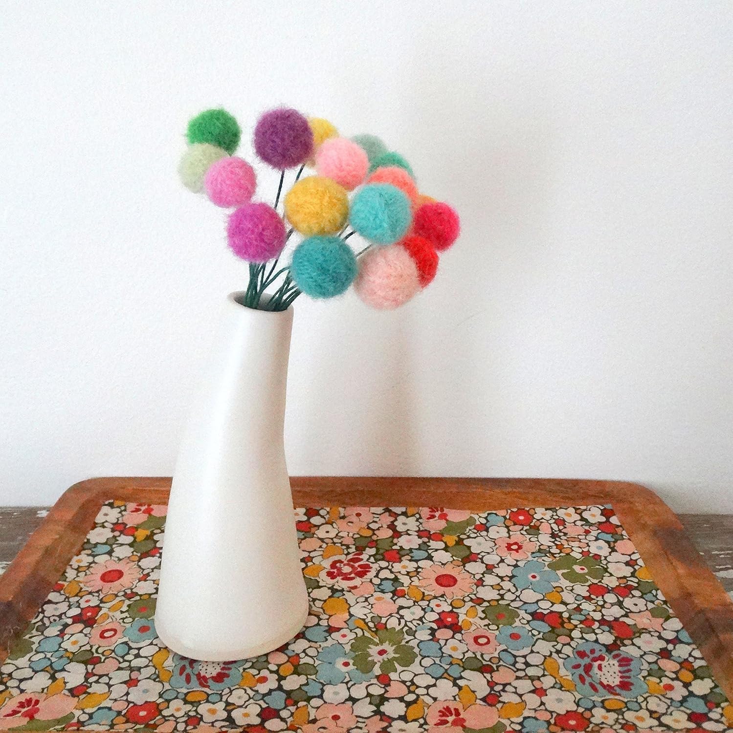 White Pottery Vase with Pom Pom Flowers. Multicolored Felt Flower Centerpiece