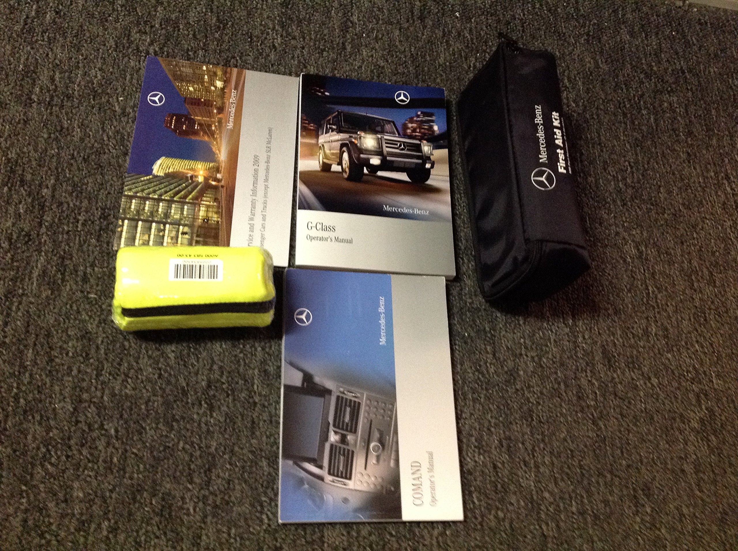 2009 MERCEDES BENZ G500 G55 AMG G WAGON Operators Owners Manual Set OEM  Paperback – 2009