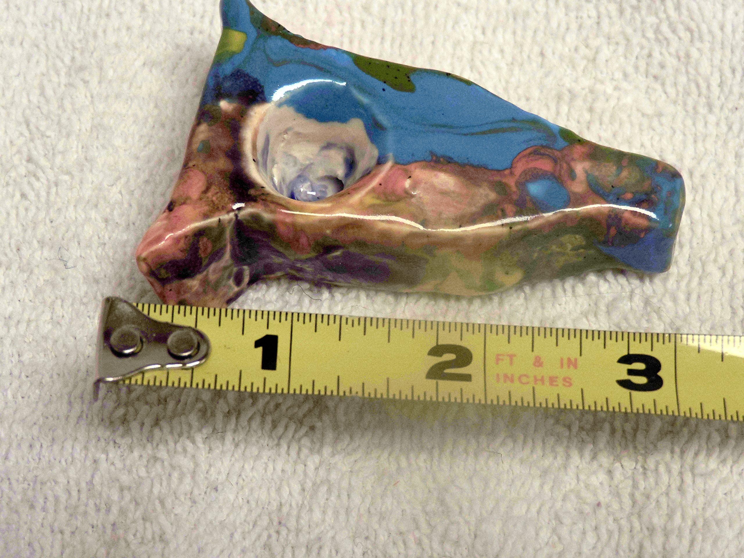 Psychedelic clay pipe. Hippie style