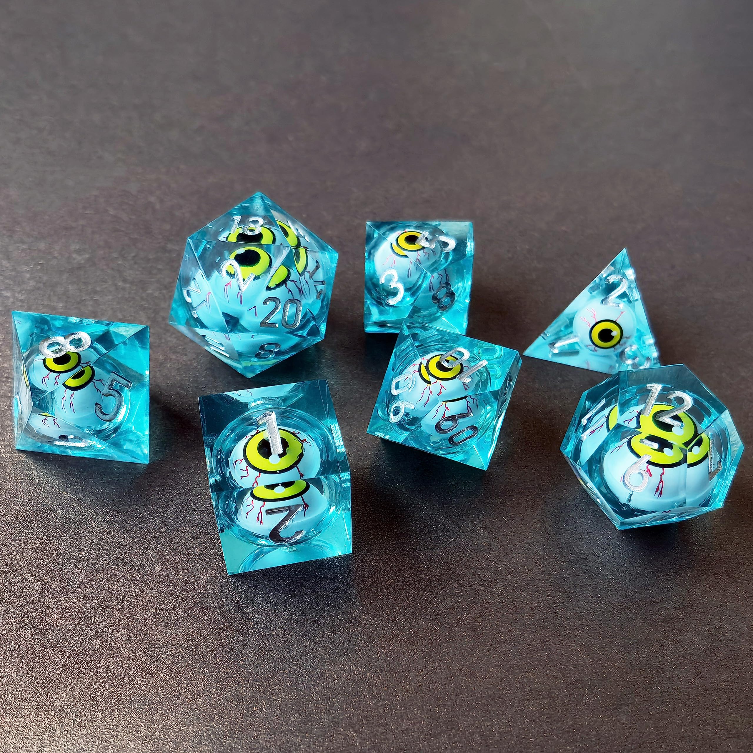 BESCON Sharp Edged Liquid Core Rolling Eyeball Polyhedral Dice Set - Razor Edge Polyhedral Dice with Rolling Eyeball Inside (7pcs Light Blue RPG Dice Set with Yellow Eye)
