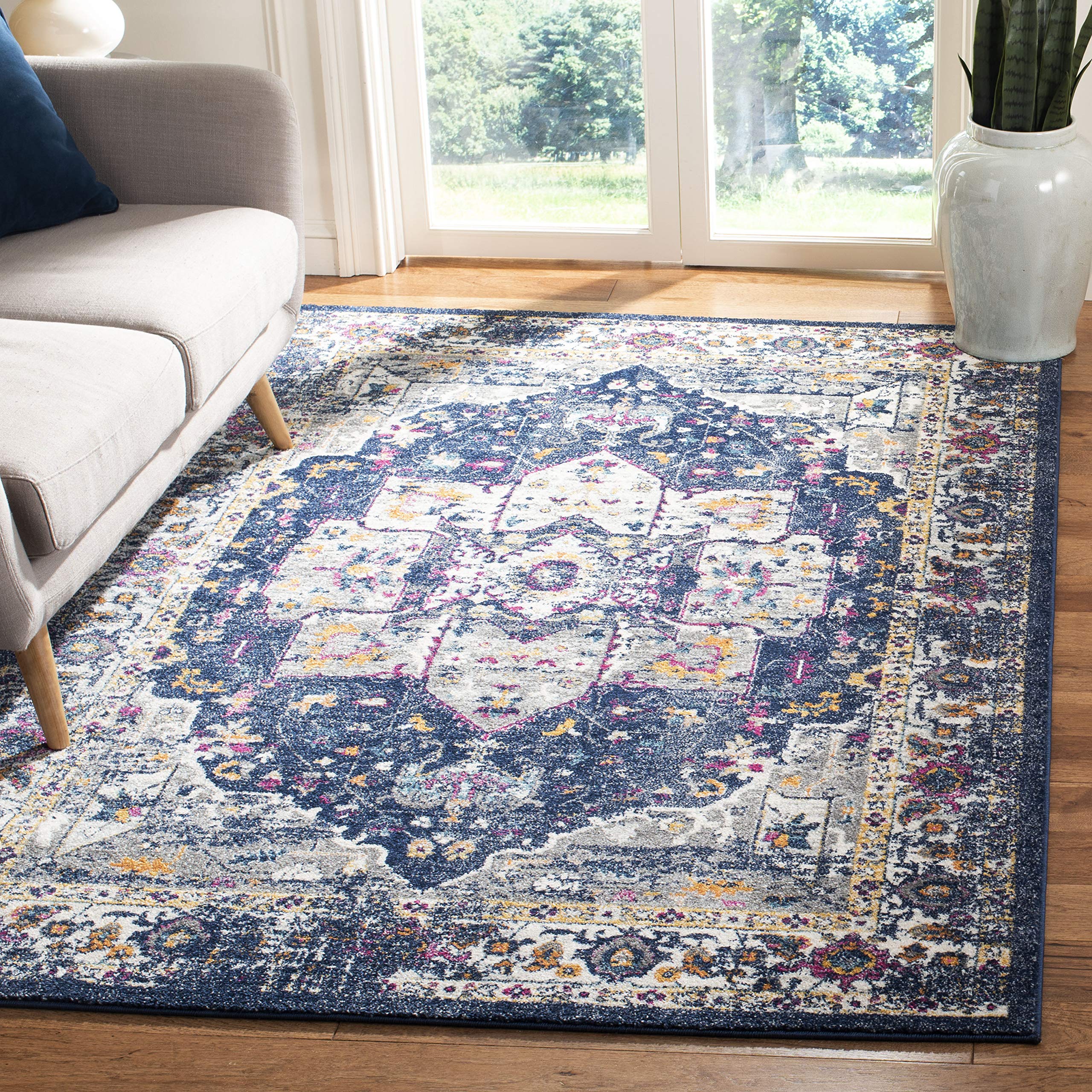 SAFAVIEH Evoke Collection Area Rug - 5'3" x 7'6", Navy & Grey, Oriental Medallion Distressed Design, Non-Shedding & Easy Care, Ideal for High Traffic Areas in Living Room, Bedroom (EVK275N) Image