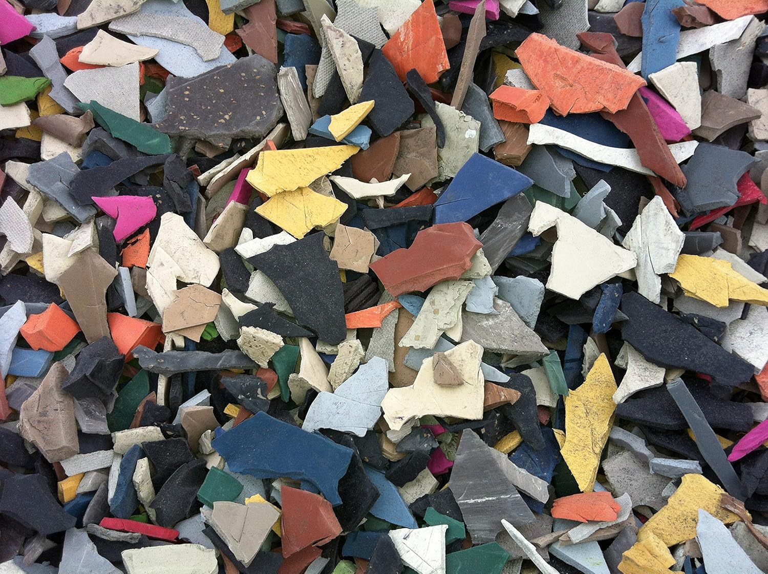 Sample of Nontire Jelly Bean Rubber Mulch Handful sized