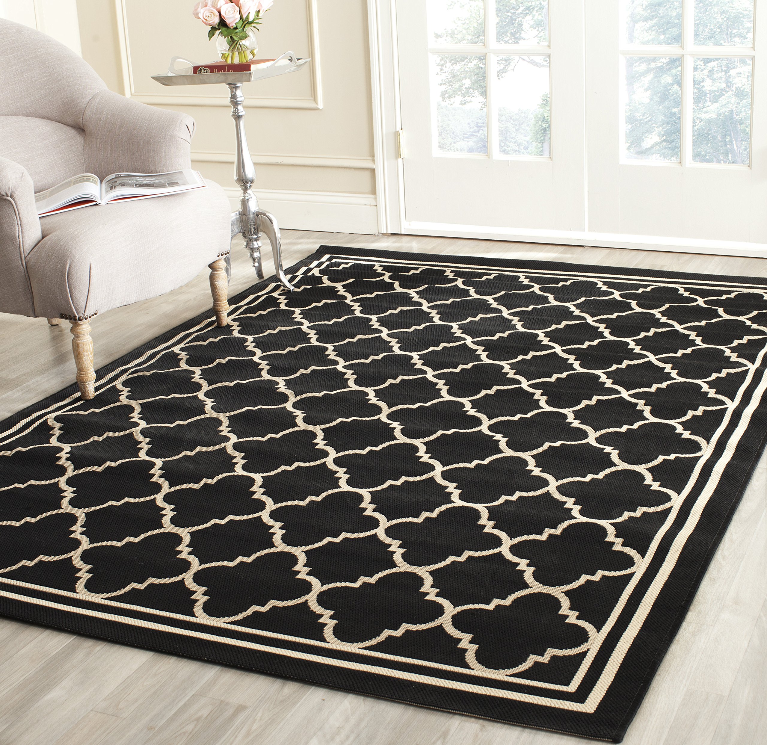 SAFAVIEH Geometric Rug for Living Room, Dining Room, Bedroom - Waterproof - Courtyard Collection, Short Pile, in Black and Beige, 79 X 152 cm โ image 1