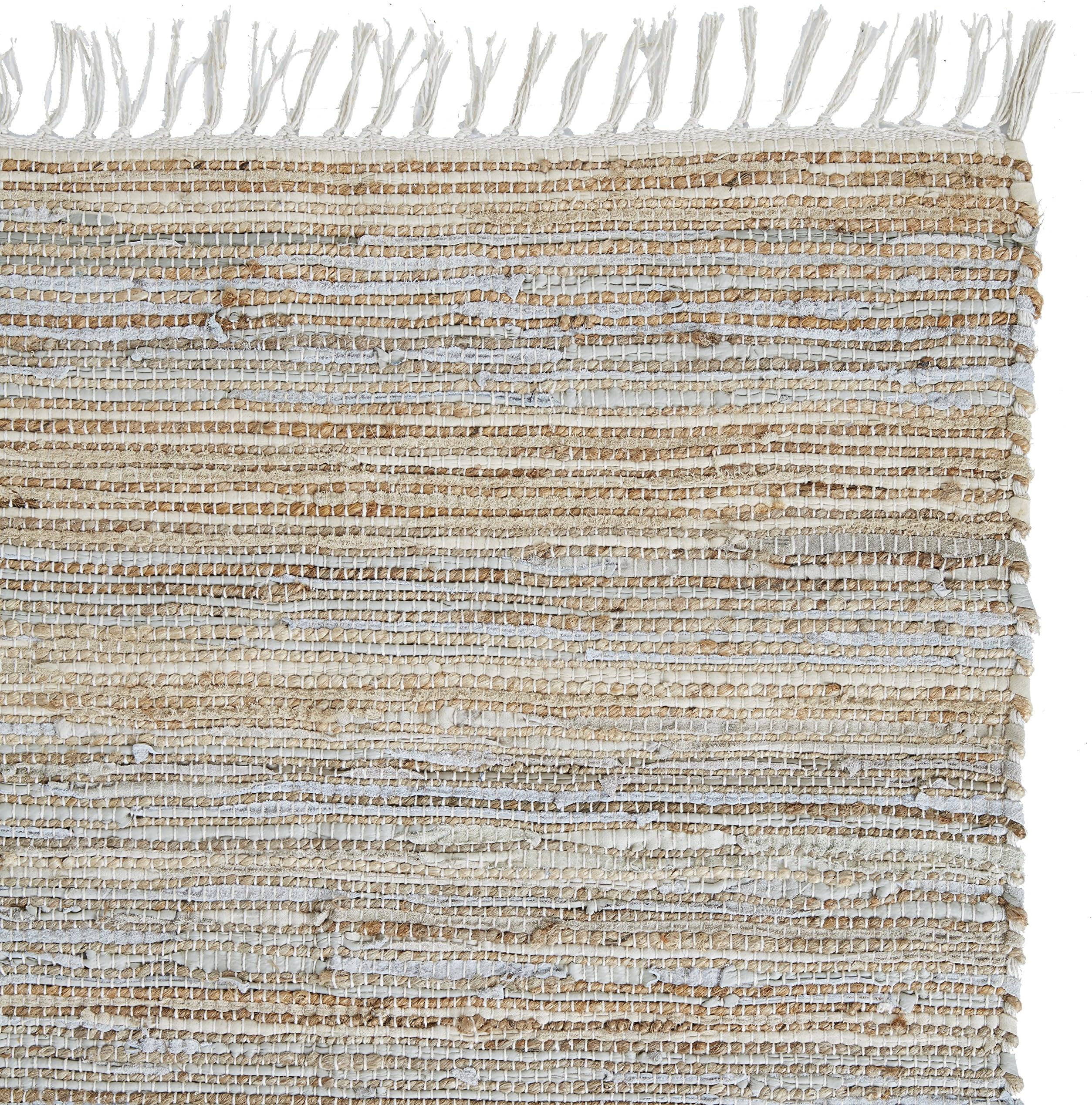 Jute and Leather Grey Rag Rug with Grey Tassel Fringe. Dimensions: 90 x 60 cm 50% Leather, 50% Jute