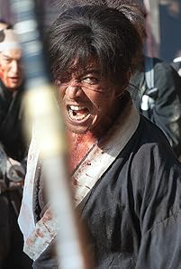 Samurai Manji has taken a lot of lives, both innocent and guilty, and now lives life in feudal Japan as a criminal. After being cursed with immortality until he kills enough evil men, Manji meets a young girl who enlists him to be her body-guard. Swearing loyalty, protection and vengeance against the group of sword fighters who slaughtered her family, the unlikely duo set on a remarkable quest to make right against those who did them wrong.