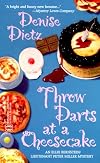 Throw Darts At A Cheesecake