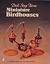 Dick Sing turns miniature birdhouses