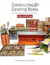 Constructing and Covering Boxes: The Art and Craft of Box Making
