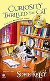 Curiosity thrilled the cat : a magical cats mystery - Sofie Kelly