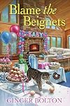 Blame the Beignets (A Deputy Donut Mystery)