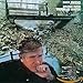 Song I Am a Rock by Buck Owens on Bridge Over Troubled Water at Amazon