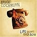 Song Slow Down Fast by Bruce Cockburn on Life Short Call Now at Amazon