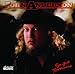Song She Sure Got Away With My Heart by John Anderson on Eye of a Hurricane at Amazon