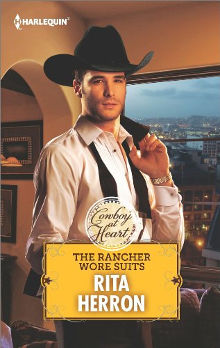 The Rancher Wore Suits (By: Rita Herron) cover