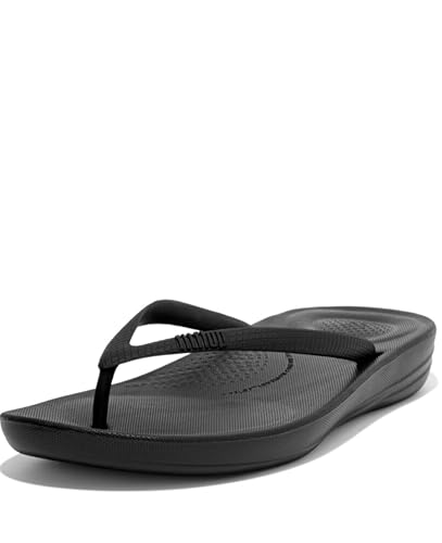 FitFlop Women's iQushion Rubber Flip-Flips with Contoured Footbed for Walking, Lightweight Ergonomic Flip Flop Sandals with Arch Support and Foot Impact Pillows, All Black, 7 US Women
