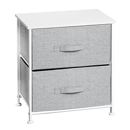 mDesign 2-Drawer Storage Chest Easy Assembly A fabric drawer nightstand with a metal frame; comes in a variety of colors and styles.