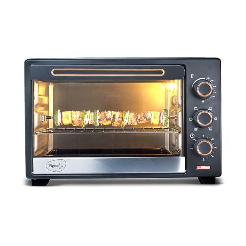 Pigeon by Stovekraft 25 litres Oven Toster and Grill (OTG) with rotisserie for grillling and Baking Cakes Pigeon by Stovekraft 25 litres Oven Toster and Grill (OTG) with rotisserie for grillling and Baking Cakes