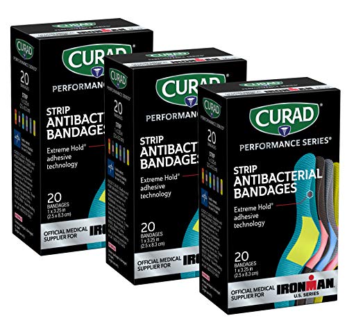 CURAD Performance Series Antibacterial Bandages, Extreme Hold Adhesive Technology, Standard Size Flexible Fabric Bandages for Cuts, Scrapes, & Burns, Assorted Colors,1 x 3.25 inches, Pack of 3