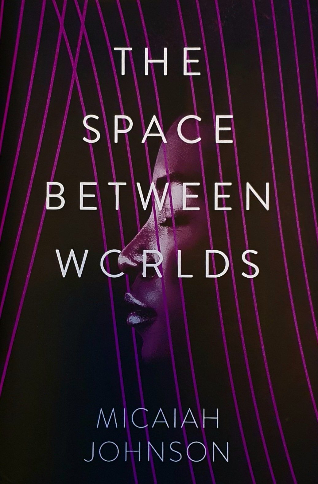 The Space Between Worlds (The Space Between Worlds #1)