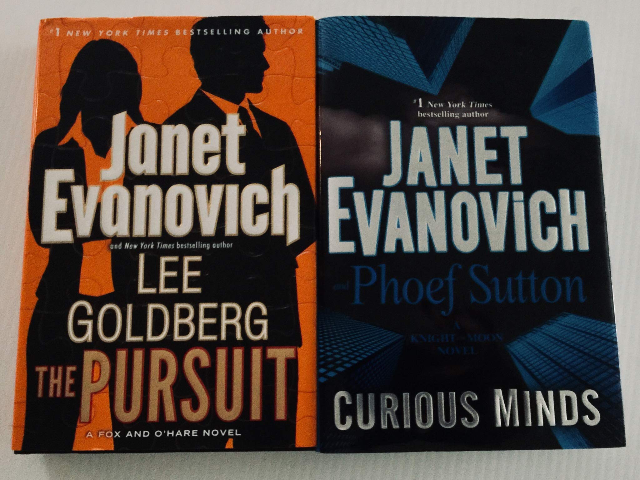 2 Books! 1) The Pursuit 2) Curious Minds by Evanovich