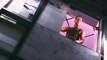 Bruce Willis in his rugged, wounded splendor in Die Hard (1988).