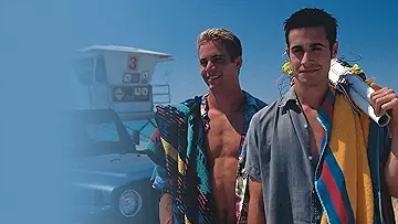 Freddie Prinze Jr. and Rachael Leigh Cook in a romantic moment from the She's All That game.