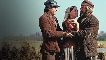 Tevye (Chaim Topol) rides in Anatevka in Fiddler on the Roof (1971).