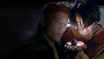 Bill (Alex Winter) and Ted (Keanu Reeves) with the Grim Reaper (William Sadler) on the poster for Bill & Ted's Bogus Journey (1991), the Bill & Ted's Bogus Journey game.