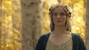 Galadriel (Morfydd Clark) ice-climbing in The Northernmost Waste in The Lord of the Rings: The Rings of Power Season 1 Episode 1, 'A Shadow of the Past'.