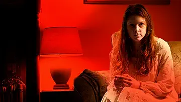 Ashley Bell becomes possessed by Abalam, in front of Patrick Fabian's priest, in The Last Exorcism (2010)