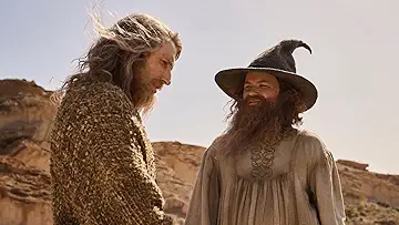 Adar (Sam Hazeldine) asks Galadriel (Morfydd Clark) for information on Sauron's whereabouts in The Lord of the Rings: The Rings of Power Season 2 Episode 6, 'Where is He'.