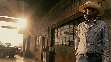 Lt. Tommy Norris (Billy Bob Thornton) looks out from a bar during sunset, in the All Roads Lead to a Hole game