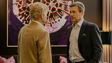 Monty Miller (Jon Hamm) talking to Tommy Norris (Billy Bob Thornton) in a hotel lobby in the Beware the Second Beating game