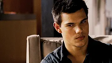 Bella Swan (Kristen Stewart) and Edward Cullen (Robert Pattinson) in their wedding attire for The Twilight Saga: Breaking Dawn – Part 1 game