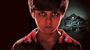 Ty Simpkins as Ty, staring creepily at the audience, on the poster for Insidious (2010).