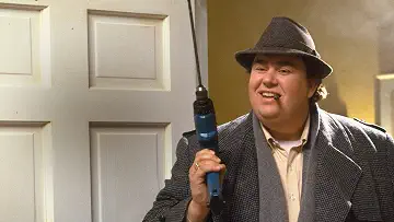 John Candy's Buck Russell smoke a cigarette while cleaning in the Uncle Buck game