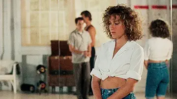 Jennifer Grey's Frances Houseman watches Patrick Swayze's Johnny Castle during a dance rehearsal for the Dirty Dancing game