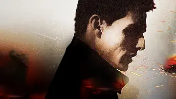 Tom Cruise as Ethan Hunt hanging from a ceiling in a suspenseful moment from the Mission: Impossible game