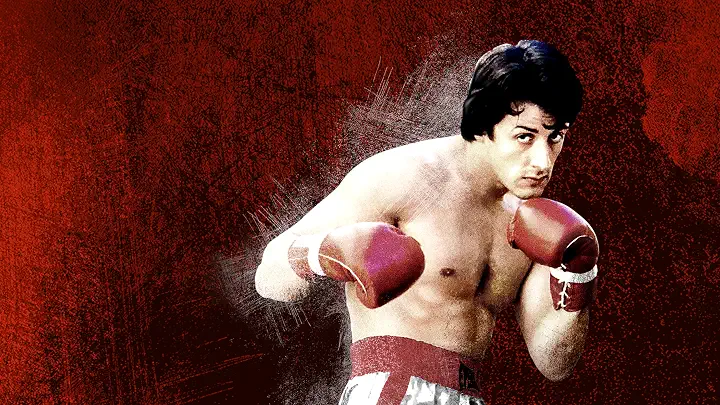 Sylvester Stallone as Rocky Balboa on a poster for Rocky (1976) the Rocky game