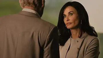 Cami Miller (Demi Moore) talking with Billy Bob Thornton (Lt. Tommy Norris) in the WolfCamp game