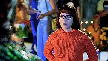 Shaggy (Matthew Lillard) and Scooby-Doo, scared of a monster in the live action Scooby-Doo movie (2002) in the Scooby-Doo: The Movie game.