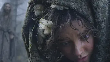 Elanor Brandyfoot (Markella Kavenaugh) recovers from getting sent flying by The Stranger's (Daniel Weyman) powers in The Lord of the Rings: The Rings of Power Season 1 Episode 5, 'Partings'.