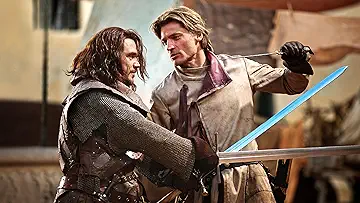 Arya Stark (Maisie Williams) attempts to warn Ned Stark (Sean Bean) of impending danger in Game of Thrones Season 1 Episode 5, 'The Wolf and the Lion'.