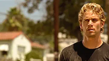 Brian O'Conner (Paul Walker) looking at the Toretto crew in The Fast and the Furious game