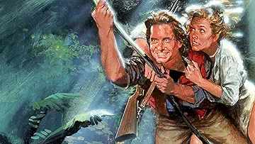 Michael Douglas as Jack Colton and Kathleen Turner as Joan Wilder in the middle of their jungle adventure in Romancing the Stone (1984).