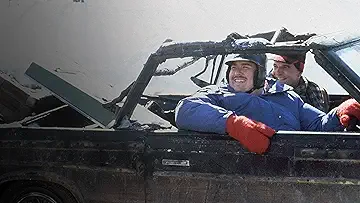 Steve Martin and John Candy looking distressed while traveling together in the Planes, Trains and Automobiles game.