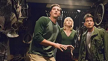 Cindy Campbell (Anna Faris), George Logan (Simon Rex), and Tom Logan (Charlie Sheen) in the Scary Movie 3 game.