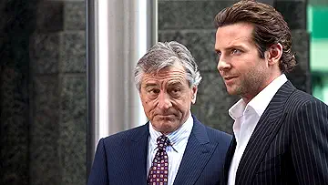Bradley Cooper and Robert de Niro have a meeting in the Limitless game.