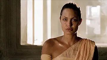 Angelina Jolie's Lara Croft brandishes her pistol in Lara Croft: Tomb Raider (2001).